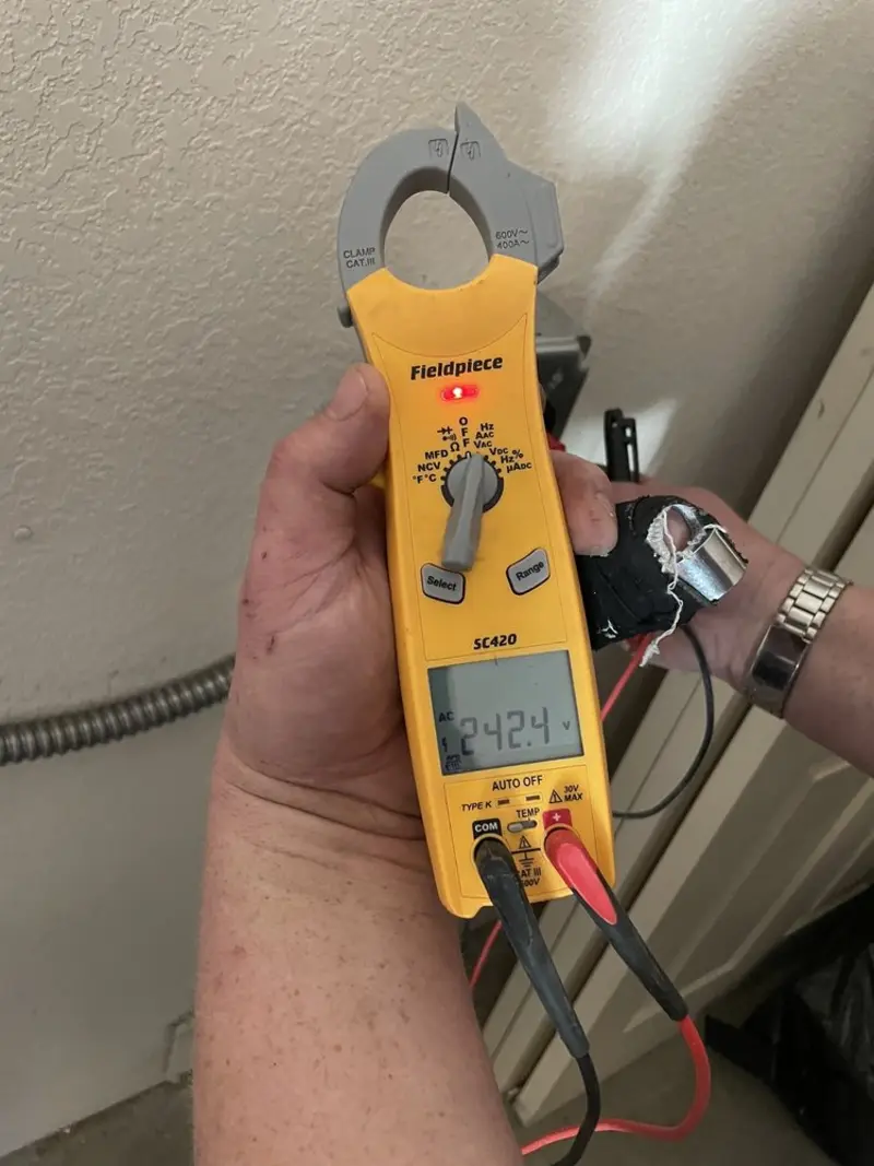 Voltage testing with clamp meter during Whole House Surge Protector in Lititz